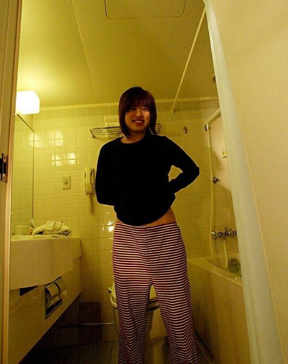 15P Hitomi Hayasaka asian teen takes bath and shows her tits