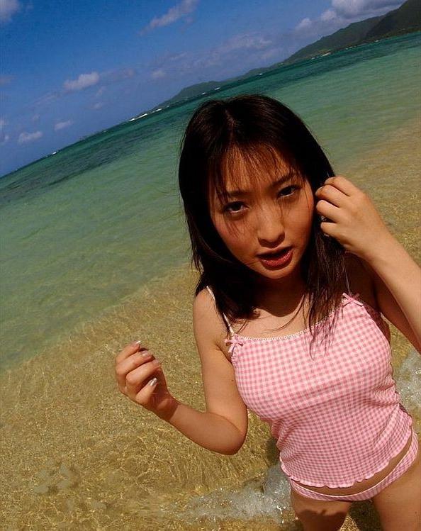 15P Hot japanese babe Maiko Kazano showing big tits outdoors