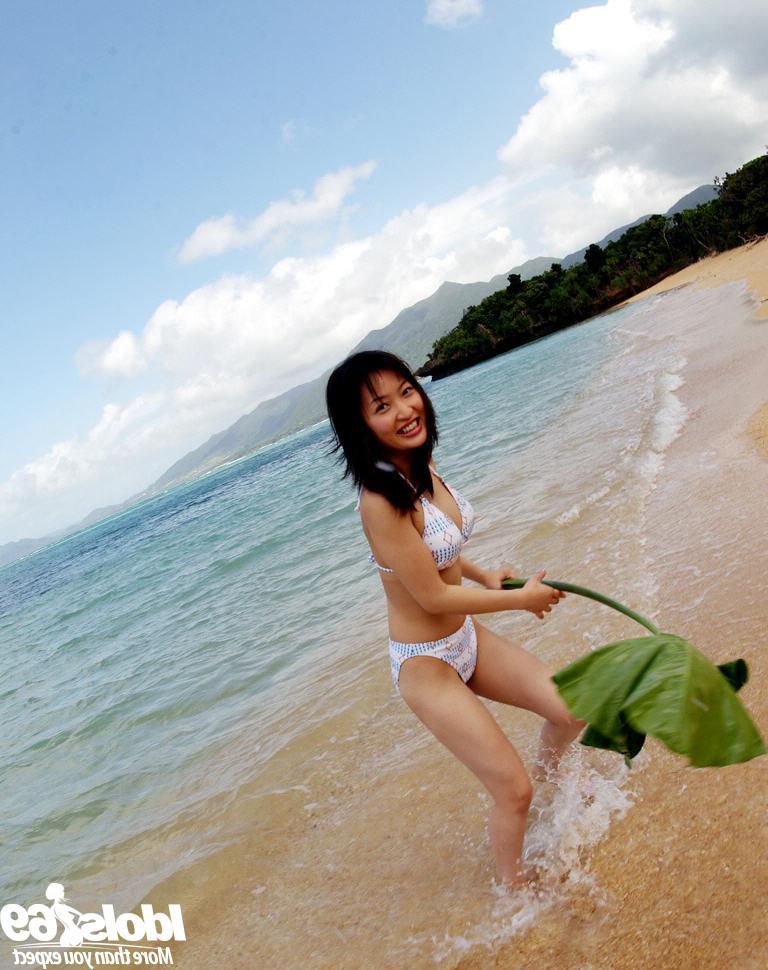 14P Japanese bikini babe outdoors