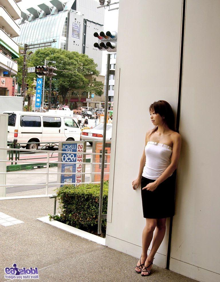 16P Hot Japanese tramp is naked on her bed showing off her body