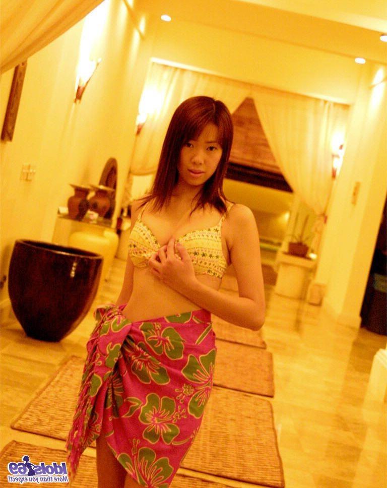 16P Japanese tramp is naked and sunning her nice tits and pussy