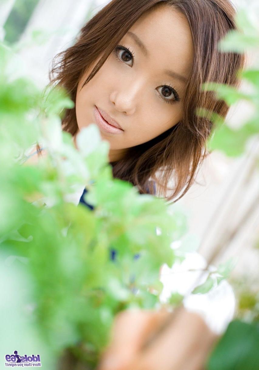 16P Jun shows off her hairy Asian pussy with a smile