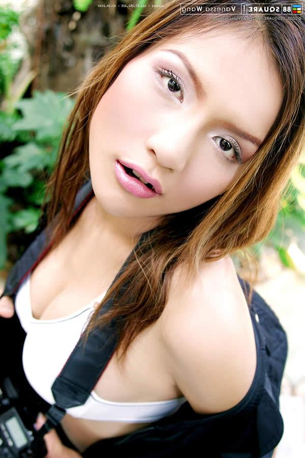 15P Beautiful thai model showing off her amazing boobs