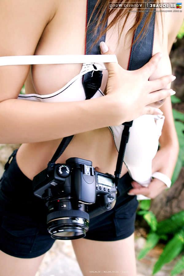 15P Beautiful thai model showing off her amazing boobs