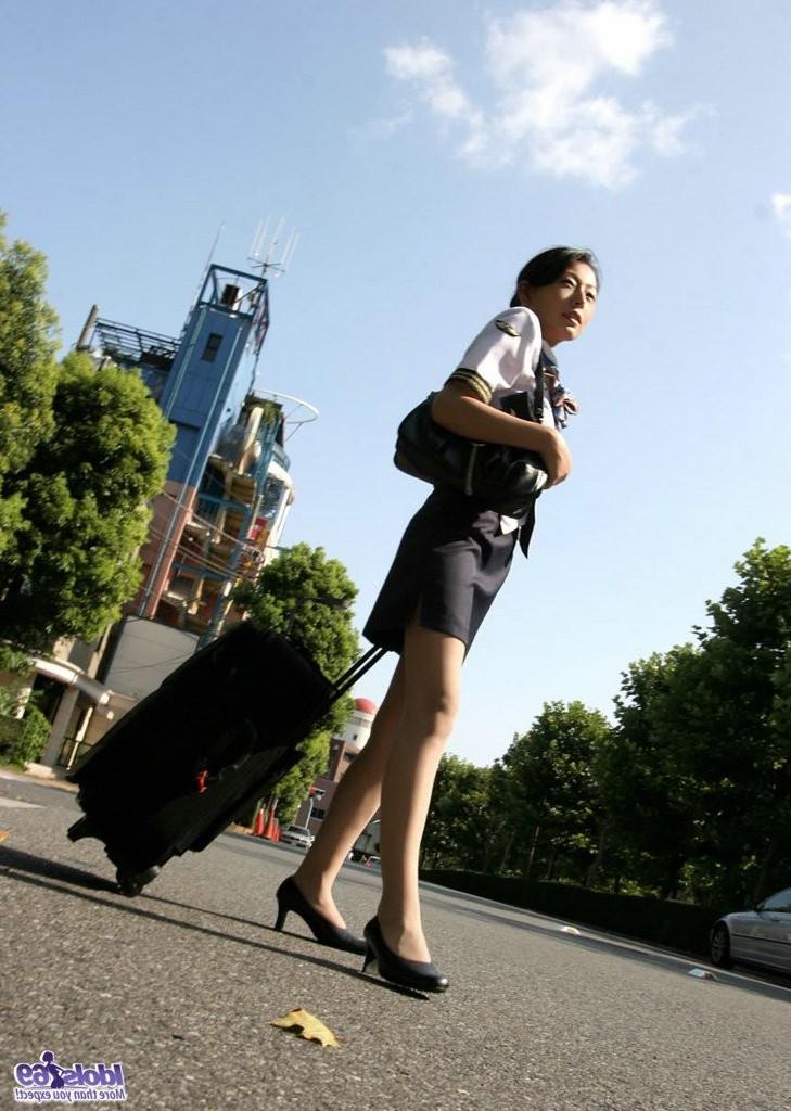15P Japanese flight attendant in a skirt and pantyhose fondled
