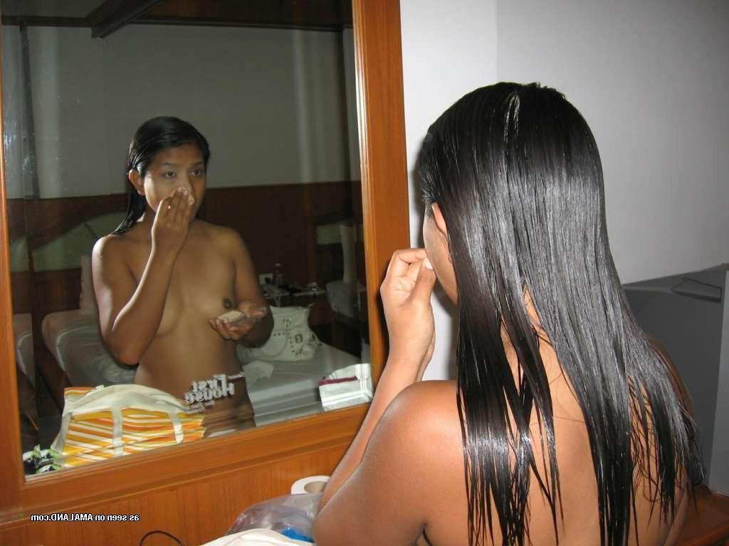 15P Amateur Asian GF shows hairy pussy in hotel room