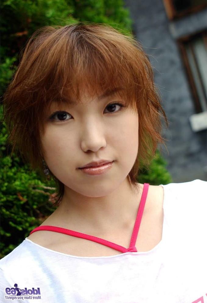 15P Shy busty japanese lady lets her titties loose in bed