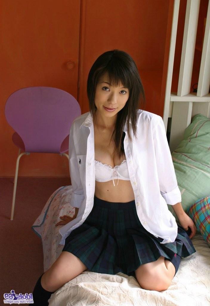 15P Japanese school girl in her uniform allowing upskirts