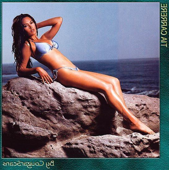 15P Waynes World babe Tia Carrera nude in the hot tub