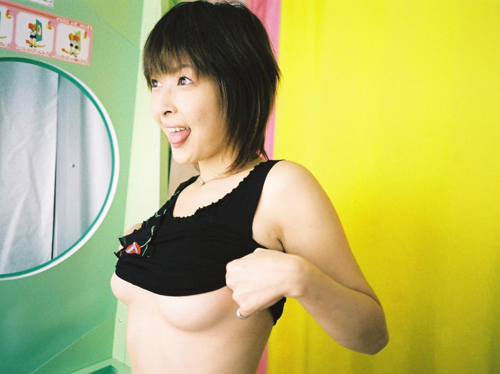 16P Naughty Asian slut is taking her daily shower soaping tits