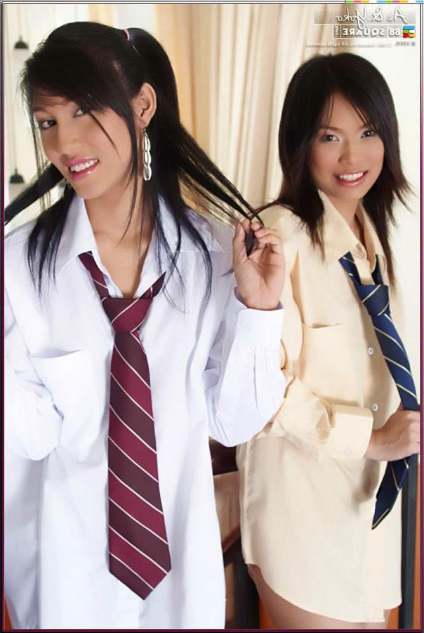 15P Two cute thai girls wearing business shirts