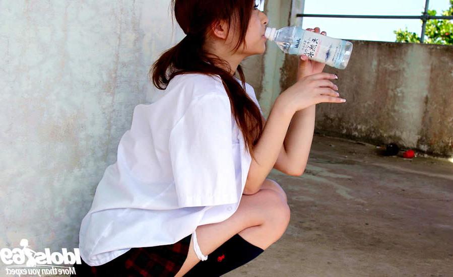 15P Cute japanese girl in a school uniform