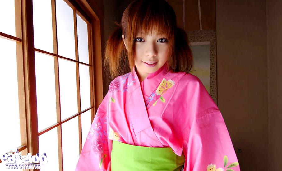 15P Cute japanese girl wearing a pink kimono