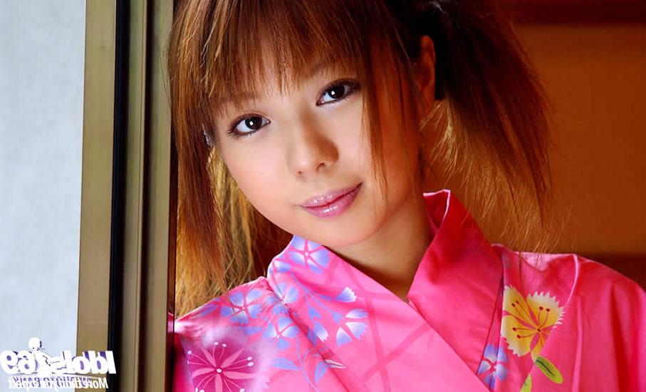 15P Cute japanese girl wearing a pink kimono