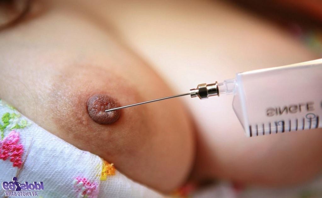 16P Beautiful Japanese nurse strips down and plays with an injection