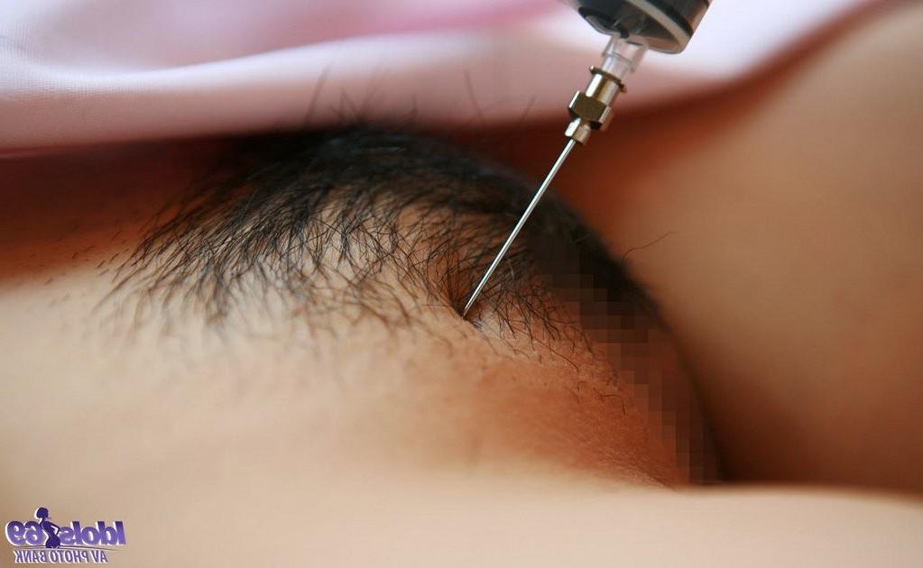 16P Beautiful Japanese nurse strips down and plays with an injection