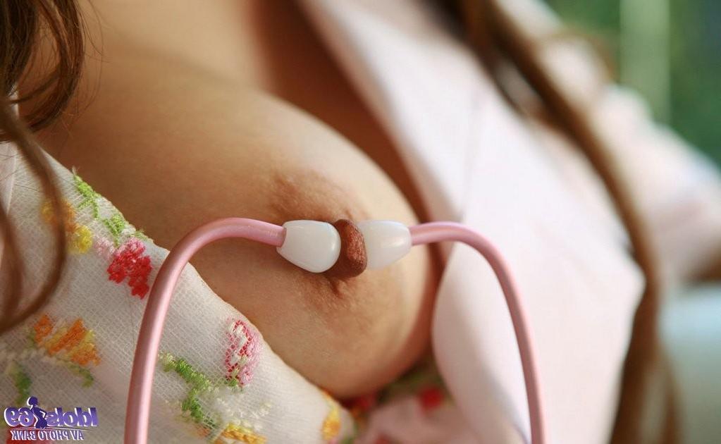 16P Beautiful Japanese nurse strips down and plays with an injection