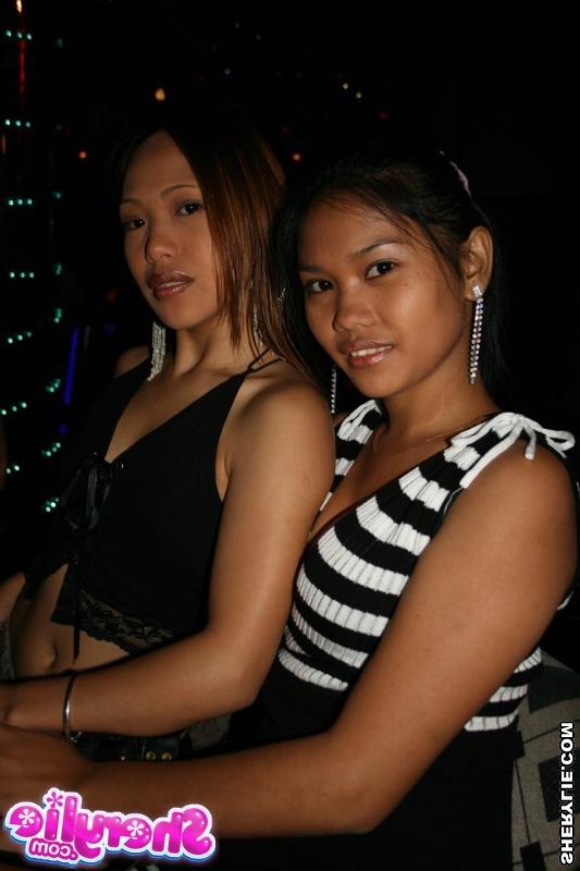 15P Sherylie and Akina tenderly kissing in a bar
