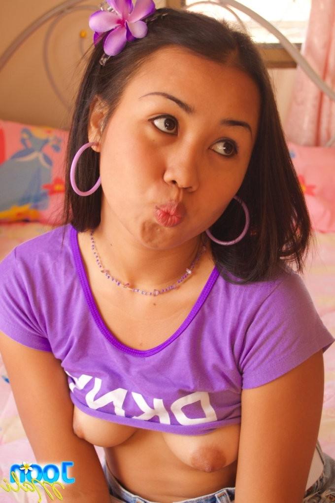 15P petite thai honey exposes tasty asian pussy