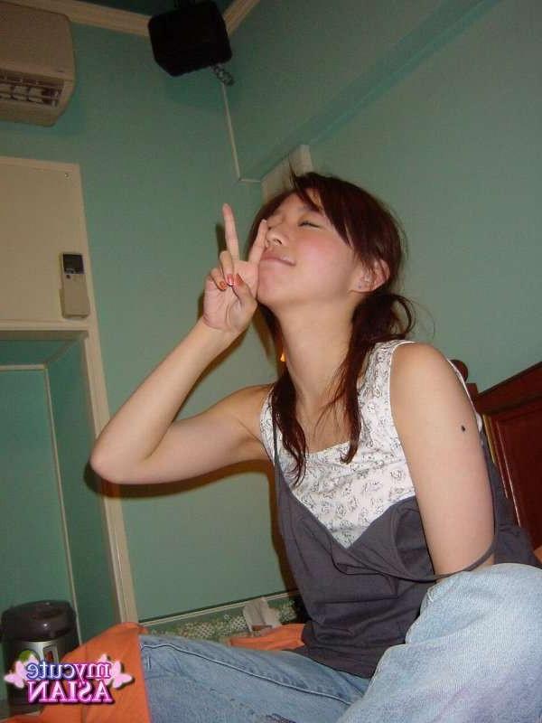 16P Asian coed plays with toy and then with a boy