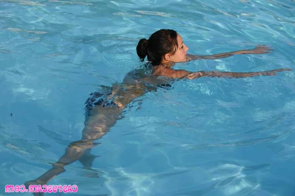 20P Busty asian teen in bikini swimming