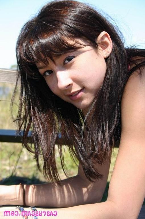 16P Cute amateur asian teen posing outdoor