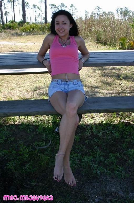 16P Cute amateur asian teen posing outdoor