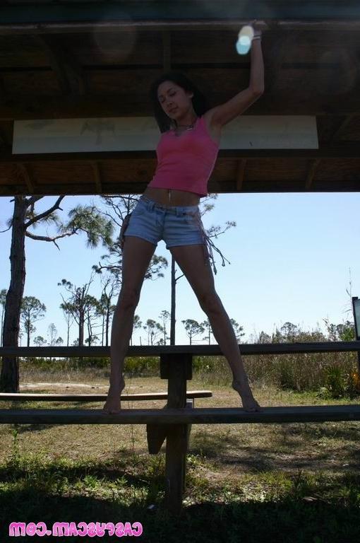 16P Cute amateur asian teen posing outdoor