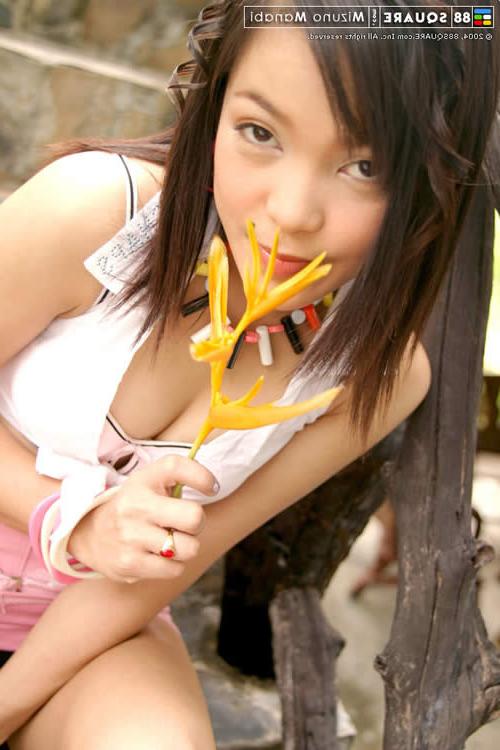 15P Cute asian teen posing outside