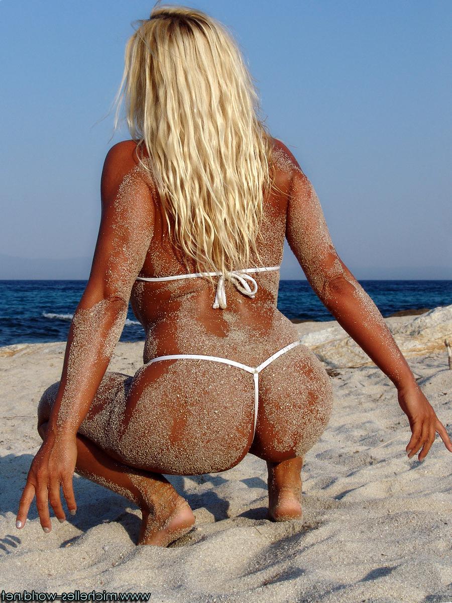 15P Wet and oily babe with sheer bikini
