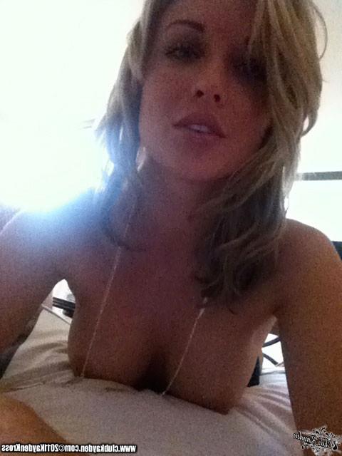 15P Kayden Kross playing with her phone camera at home