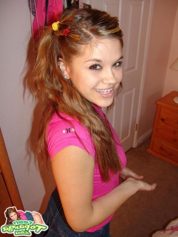 16P Sexy Teen With Braces Playing A Board Game