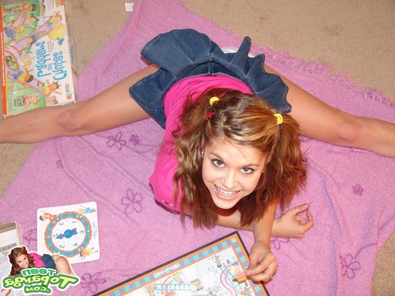 16P Sexy Teen With Braces Playing A Board Game