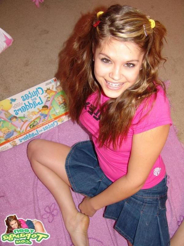 16P Sexy Teen With Braces Playing A Board Game