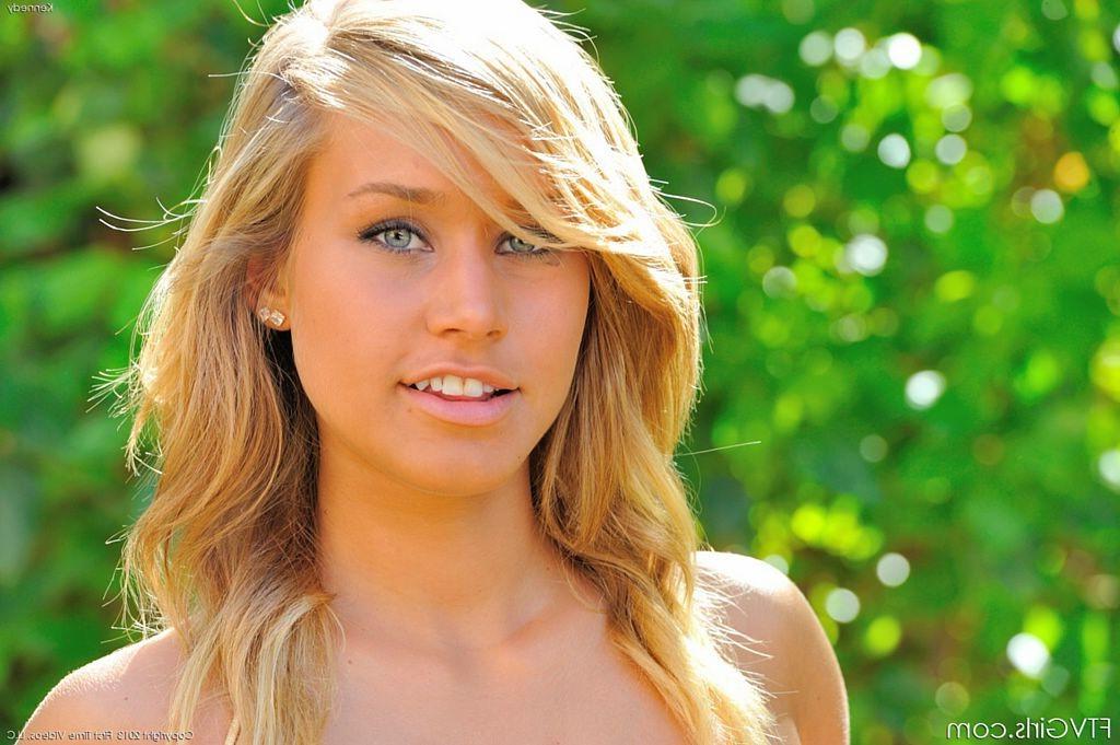 15P Gorgeous blonde teen in gold bikini stuffs her bottoms