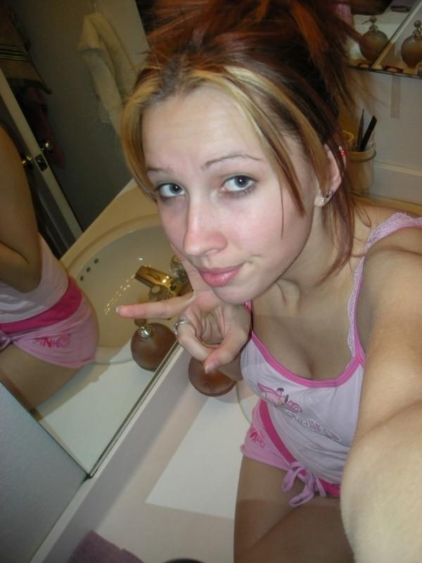 15P Gorgeous blonde teen with nice tits posing on camera naked