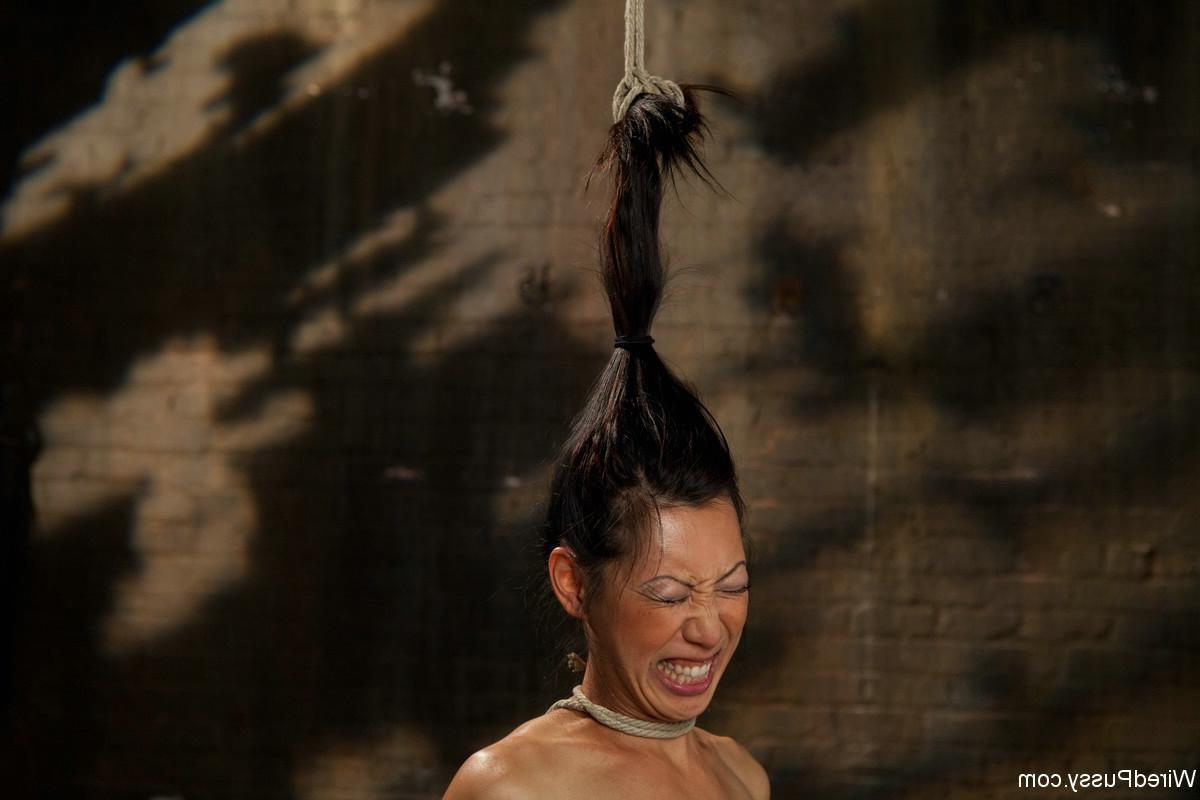 24P Tia Ling has been tied up, caned, fucked and whipped by domina