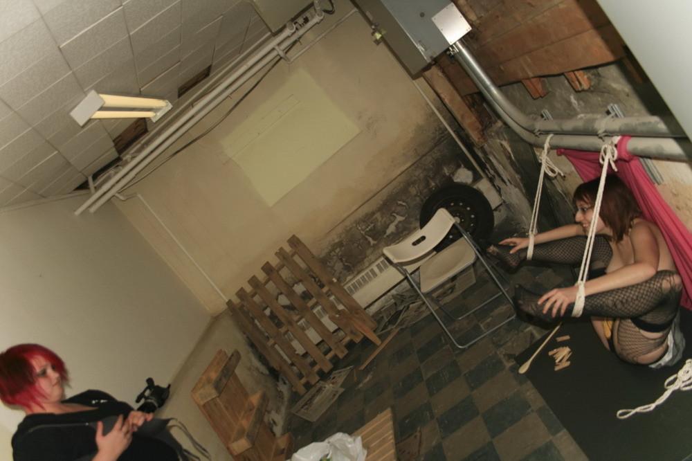 16P Marcy is tied to humiliate to pipes in a nasty basement.