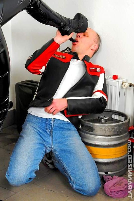 16P Rough biker chick makes slave suck her high heels