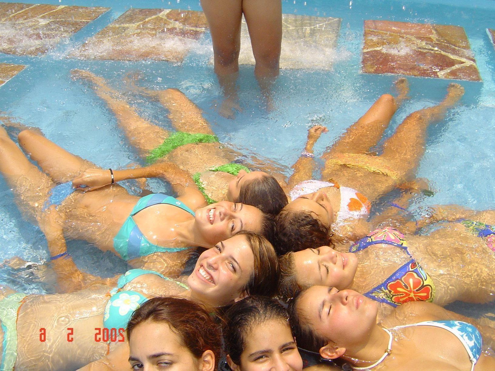 16P Very Cute Girls Lay Out Sunbathing On Public Beach In Bikinis