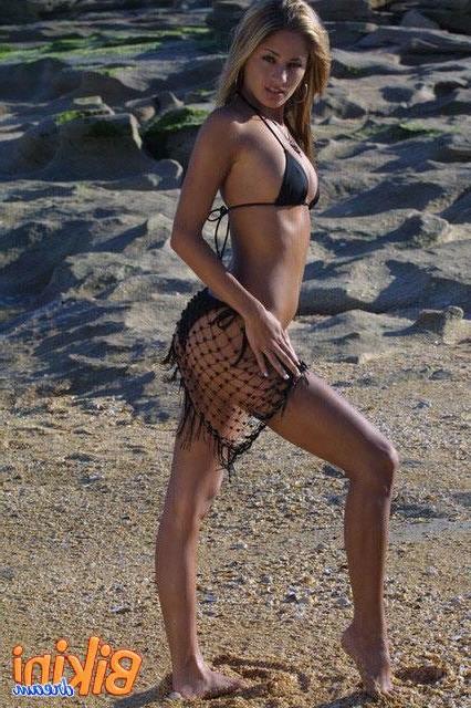 15P Babe in a bikini at the beach
