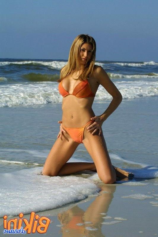 15P Babe in a bikini at the beach