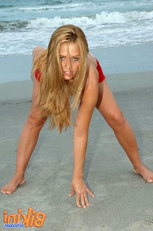15P Babe at the beach in a bikini