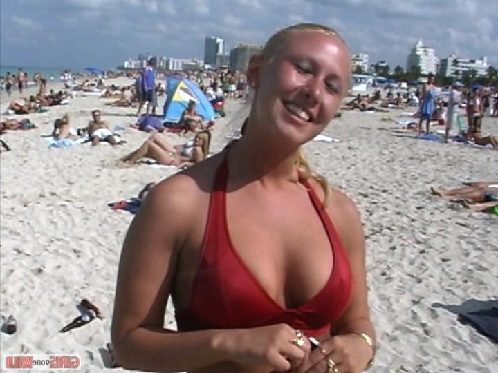 10P Blonde bikini beach babe shows her huge juggs