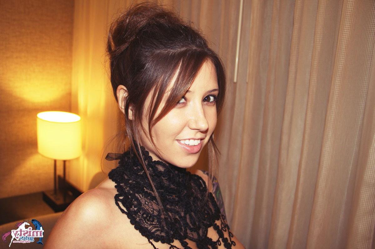 16P Stunning brunette chick Misty Gates teases in the hotel room