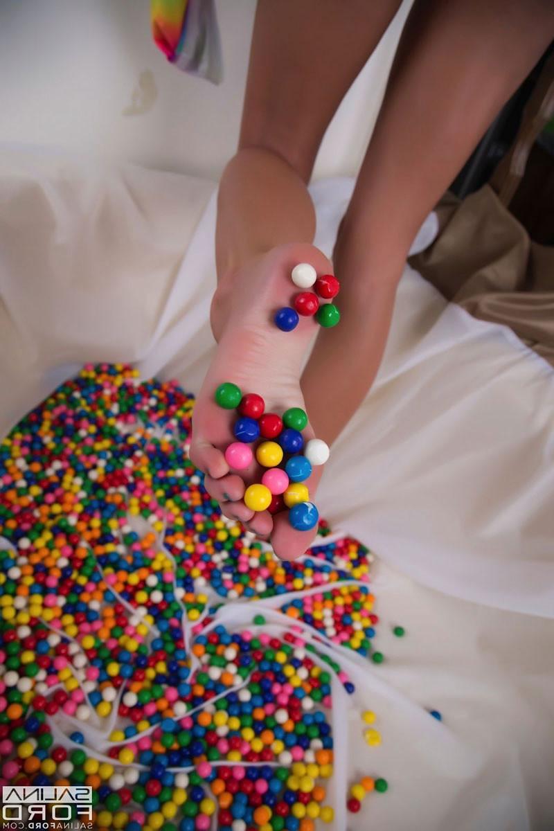 15P Stunning Salina Ford undressing and playing with sweet beans