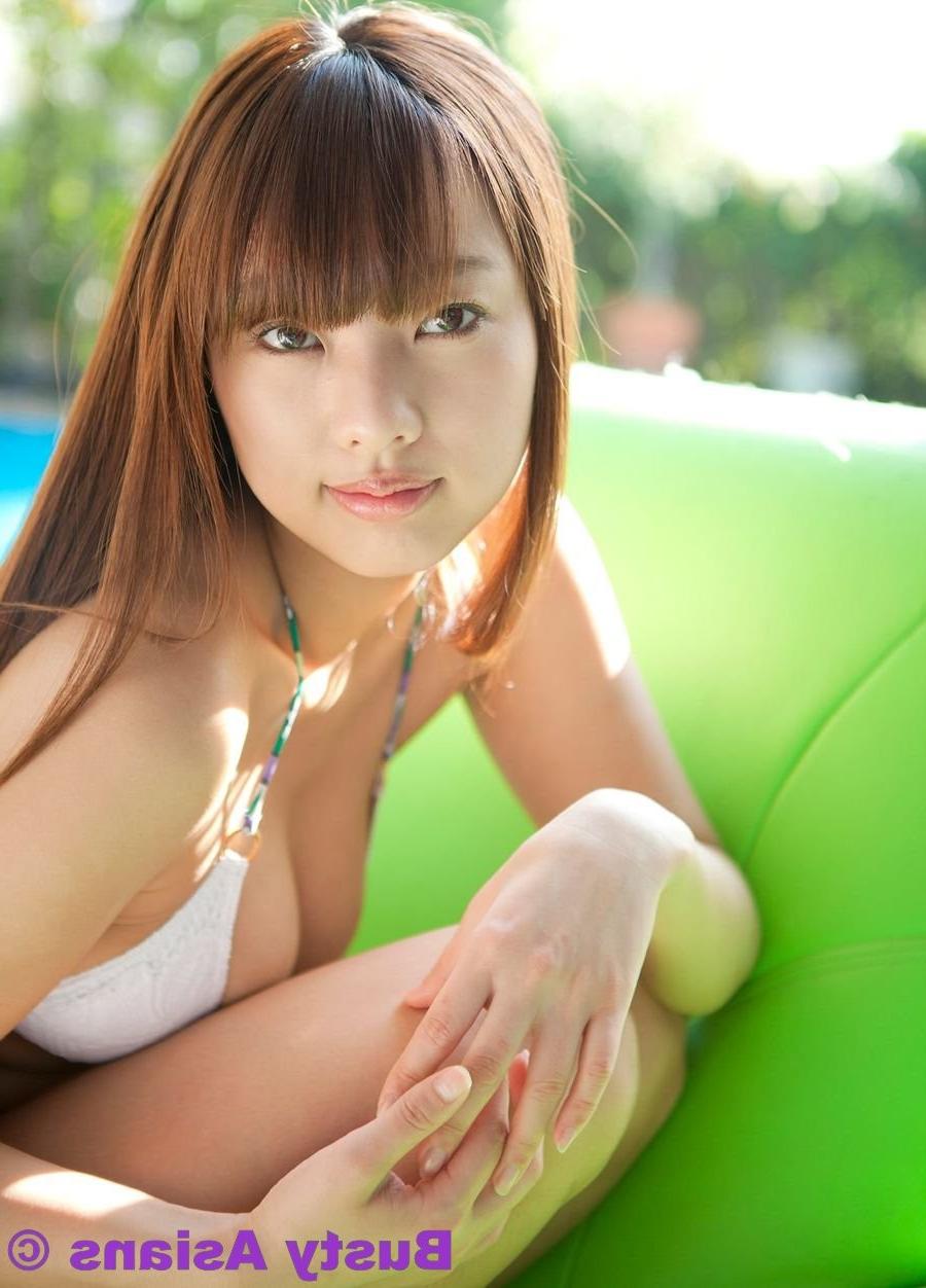 15P Busty asian Sayuki Matsumoto posing outdoors in bikini