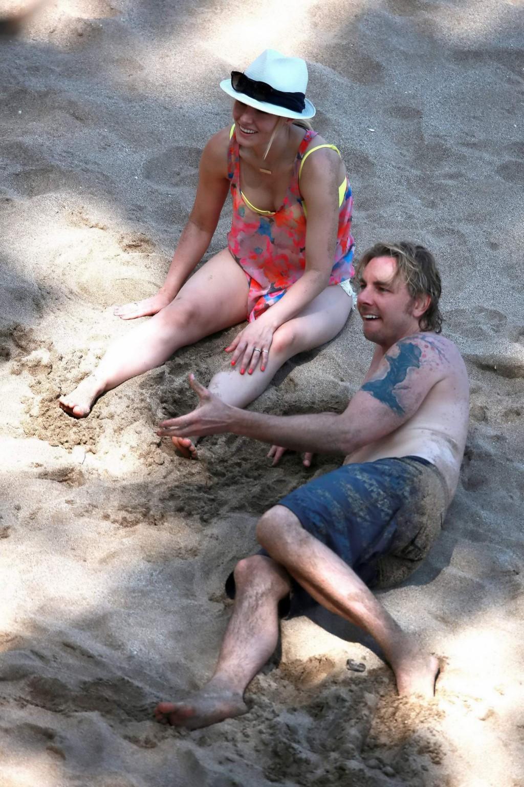 16P Kristen Bell showing off her yellow bikini ass at the beach in Hawaii
