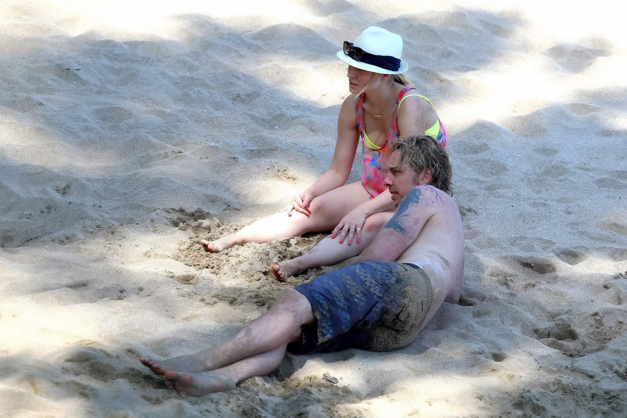 16P Kristen Bell showing off her yellow bikini ass at the beach in Hawaii