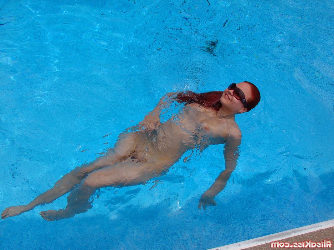 16P Redhead teen strips off bikini
